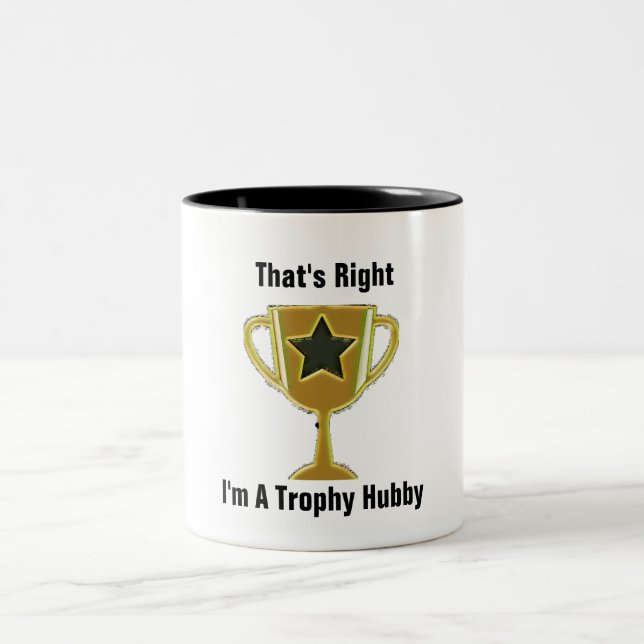 TAZA BICOLOR ESO ES CIERTO, SOY UN TROFY HUBBY (Centro)