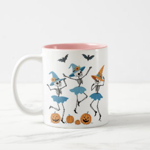 Taza Bicolor Esqueletos bailarines y brujas bordando Halloween