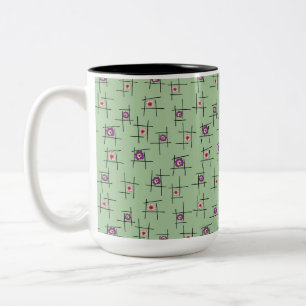 Taza Bicolor Flores geométricas y palos sobre fondo verde