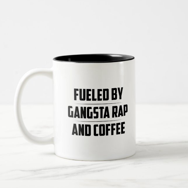 TAZA BICOLOR FUERADO POR GANGSTA RAP Y CAFÉ (Izquierda)