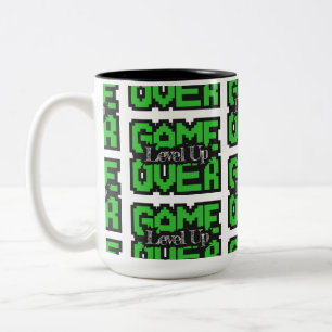 Taza Bicolor Game Over, Level Up: Aventura Retro de Píxeles en 