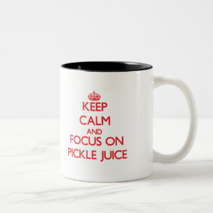 Taza Bicolor Guarde la calma y el foco en el jugo de la
