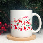Taza Bicolor Holly Jolly Navidades Festividades de Guión Rojo<br><div class="desc">El diseño de tazas de café de vacaciones presenta la tipografía de texto con letras de la mano "Have a Holly Jolly Navidades",  con ilustraciones florales y verdes en colores festivos rojos y verdes.</div>