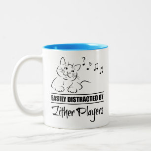 Taza Bicolor Jugadores de Zither distraen fácilmente a un gato