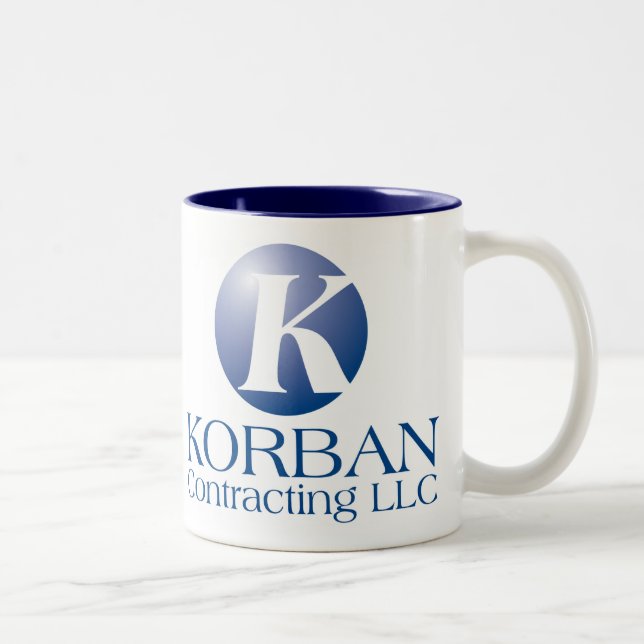 TAZA BICOLOR KORBAN CONTRACTING LLC (Derecha)