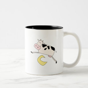 Taza Bicolor La vaca salta sobre las camisetas y los regalos de