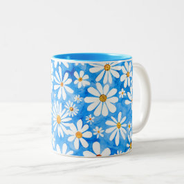 Taza Bicolor Las margaritas blancas con un fondo azul. Arte dib