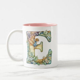 Taza Bicolor Leche arco iris inicial "E"
