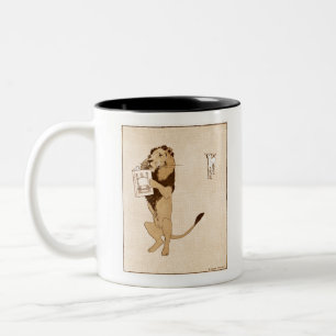 Taza Bicolor León vintage y un libro de Edward Penfield