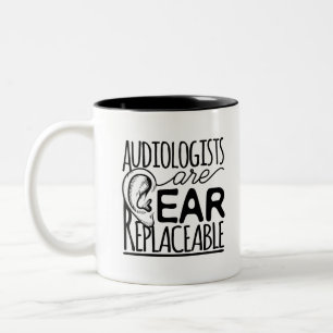Taza Bicolor Los Audiólogos Son Sustituibles Por El Oído