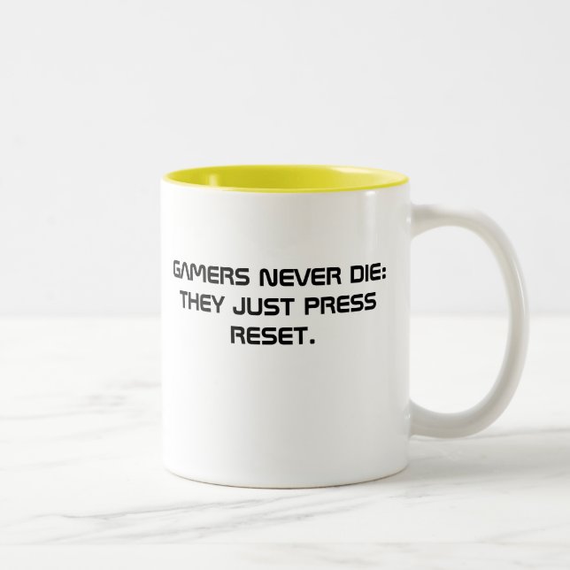 TAZA BICOLOR LOS VIDEOJUGADORES NUNCA MUEREN: APENAS PRESIONAN (Derecha)