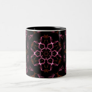 Taza Bicolor Mandala rosa y Naranja sobre fondo negro