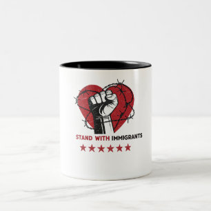 TAZA BICOLOR MANTENERSE CON LOS INMIGRANTES