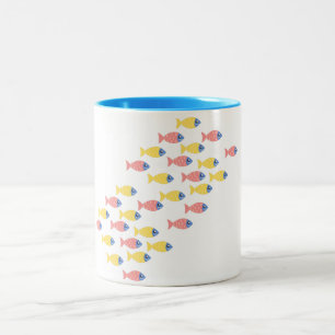 Taza Bicolor Migración de peces coloridos