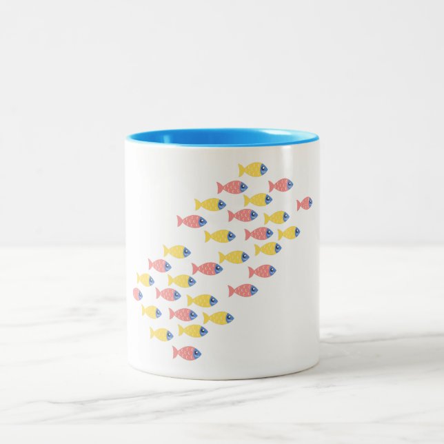 Taza Bicolor Migración de peces coloridos (Centro)