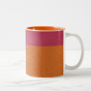 Taza Bicolor Mirada de cuero rosada y anaranjada