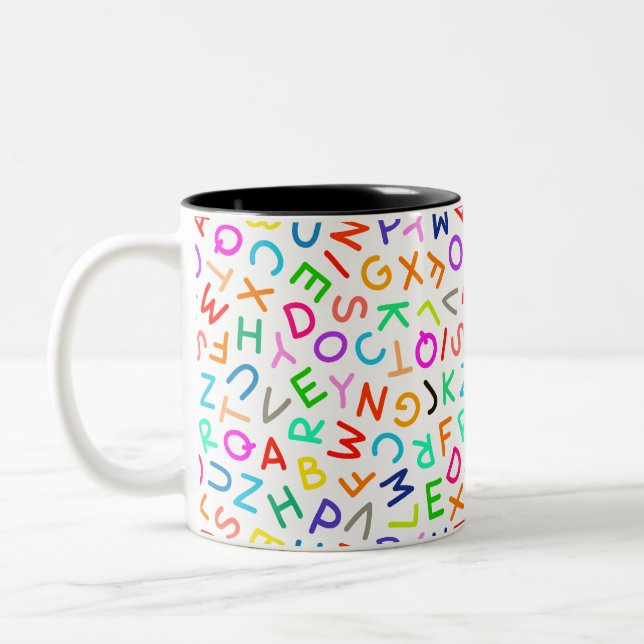 TAZA BICOLOR MULTICOLORED LETTERS (Izquierda)