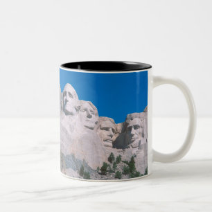 Taza Bicolor NA, los E.E.U.U., SD, el monte Rushmore.
