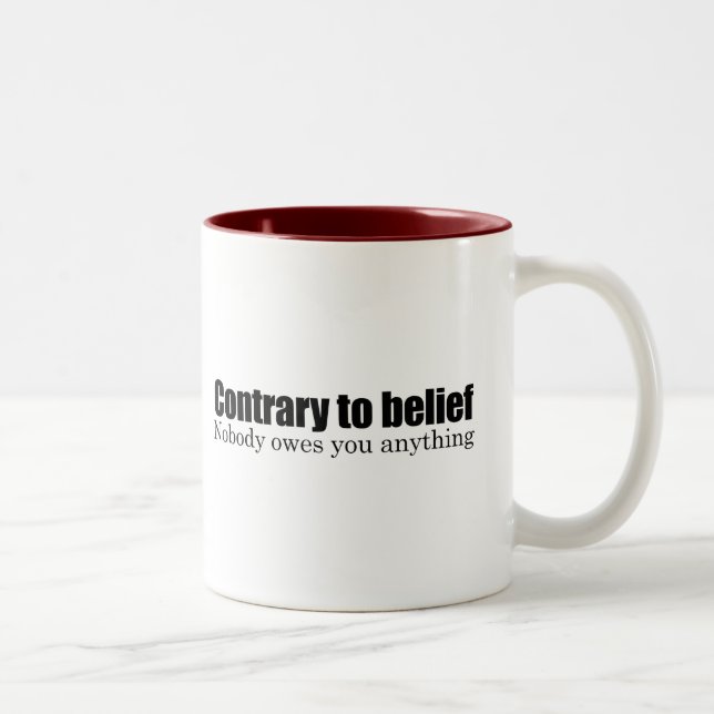 Taza Bicolor Nadie le debe cualquier cosa (Derecha)