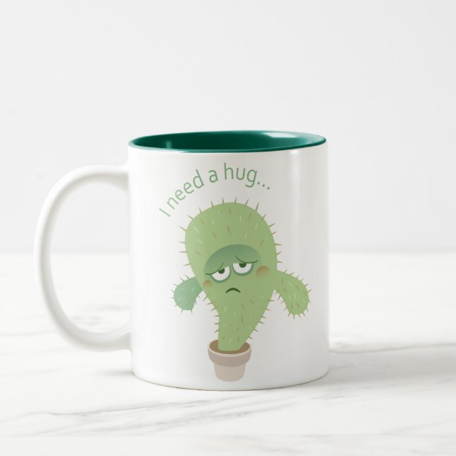 Taza Bicolor Necesito un abrazo… ¡Tazas! (Izquierda)