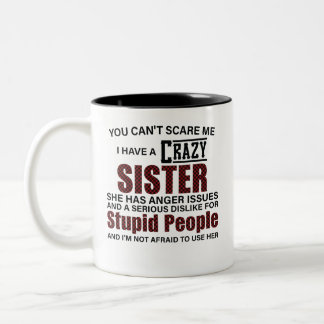 Taza Bicolor No puedes asustarme, tengo una hermana loca.