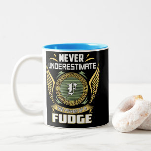 Taza Bicolor Nunca Subestimes El Poder De Un Fudge