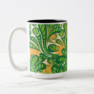 Taza Bicolor Patrón artístico verde y dorado que representa un