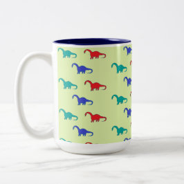 Taza Bicolor Patrón de dinosaurios coloridos sobre verde
