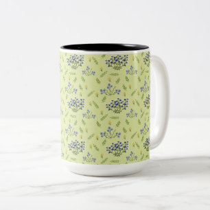 Taza Bicolor patrón de flores púrpura y amarilla