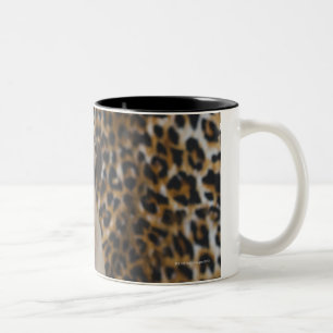 Taza Bicolor Perrito del barro amasado que se sienta contra