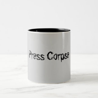 Taza Bicolor Presione el cadáver