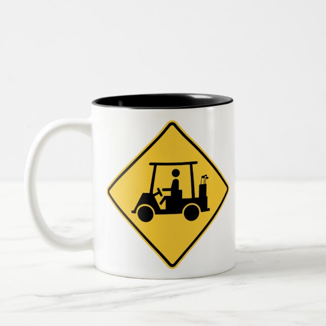 Taza Bicolor Rótulo de precaución en carrito de golf (Izquierda)