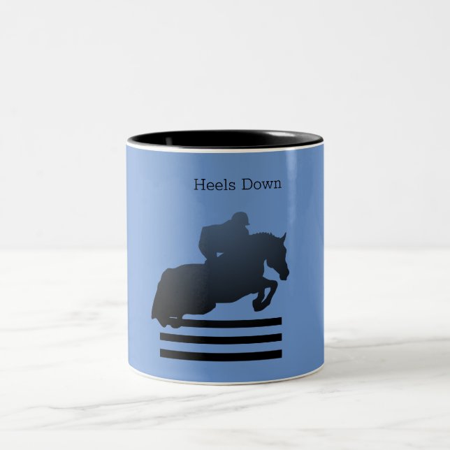Taza Bicolor Salta obstáculos superando un obstáculo.       (Centro)