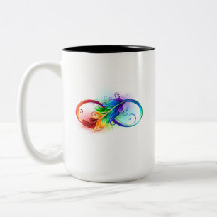 Taza Bicolor Símbolo infinito con plumas arcoiris