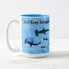 Taza Bicolor "Sólo sigan nadando tiburones"