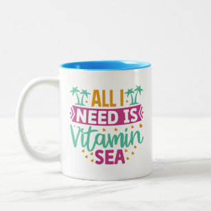 Taza Bicolor Todo lo que necesito es vitamina de mar
