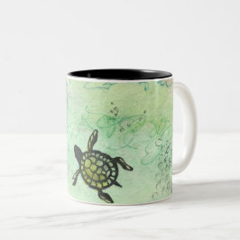 Taza Bicolor Tortuga odisea en un tazón de café