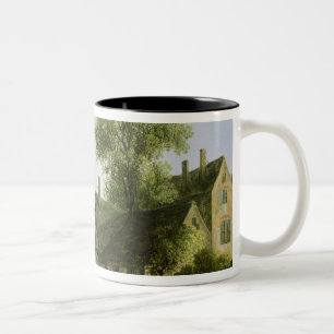 Taza Bicolor Una ciudad en un río con un puente