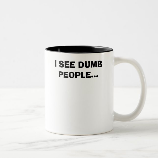 TAZA BICOLOR VEO A GENTE MUDA… (Derecha)
