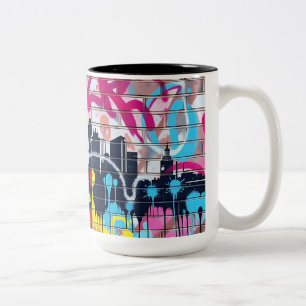 Taza Bicolor Vibrante Skyline de la ciudad pintada con aerosol
