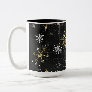 Taza Bicolor Xmas copos de nieve dorados sobre fondo negro