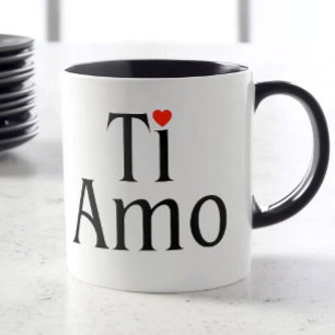Taza blanca Ti Amo con asa negra y detalle de cora