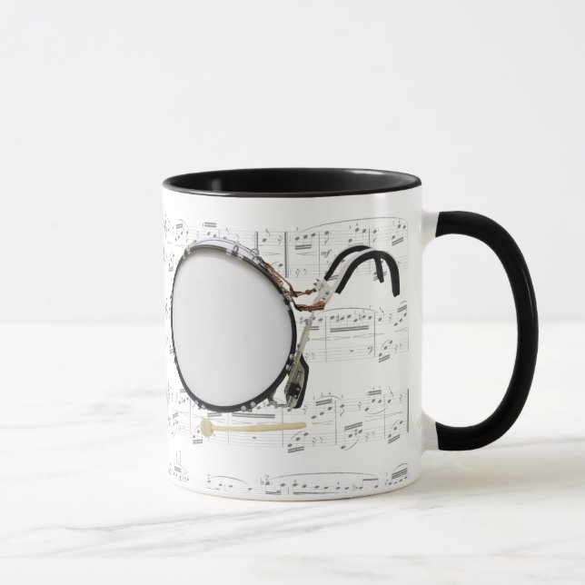 Taza - bombo que marcha con partitura (Derecha)