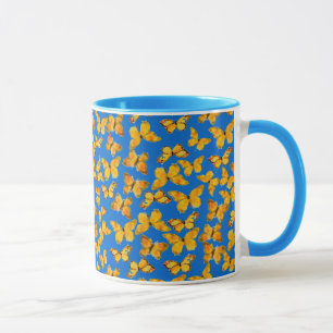 Taza Bonito Ringer Mug, mariposas doradas sobre el ciel
