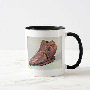 Taza Bota que pertenece a Charles Mauricio