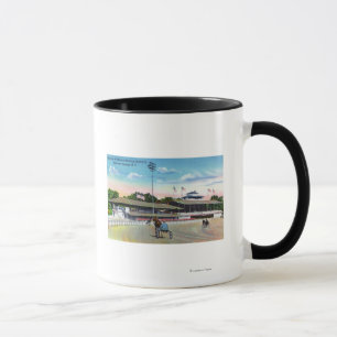 Taza Caballos con entrenamiento matutino en la pista