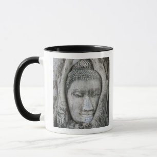 Taza Cabeza de piedra arenisca de Buda rodeada de un ár