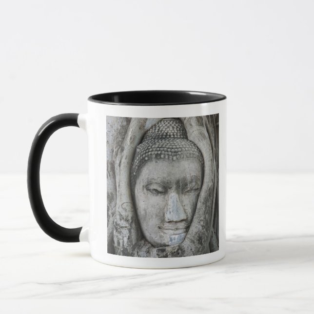 Taza Cabeza de piedra arenisca de Buda rodeada de un ár (Izquierda)