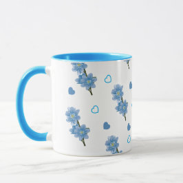 Taza Café con flores blancas y azules