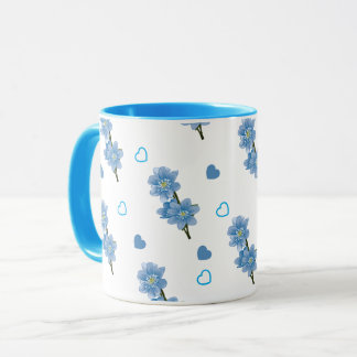 Taza Café con flores blancas y azules